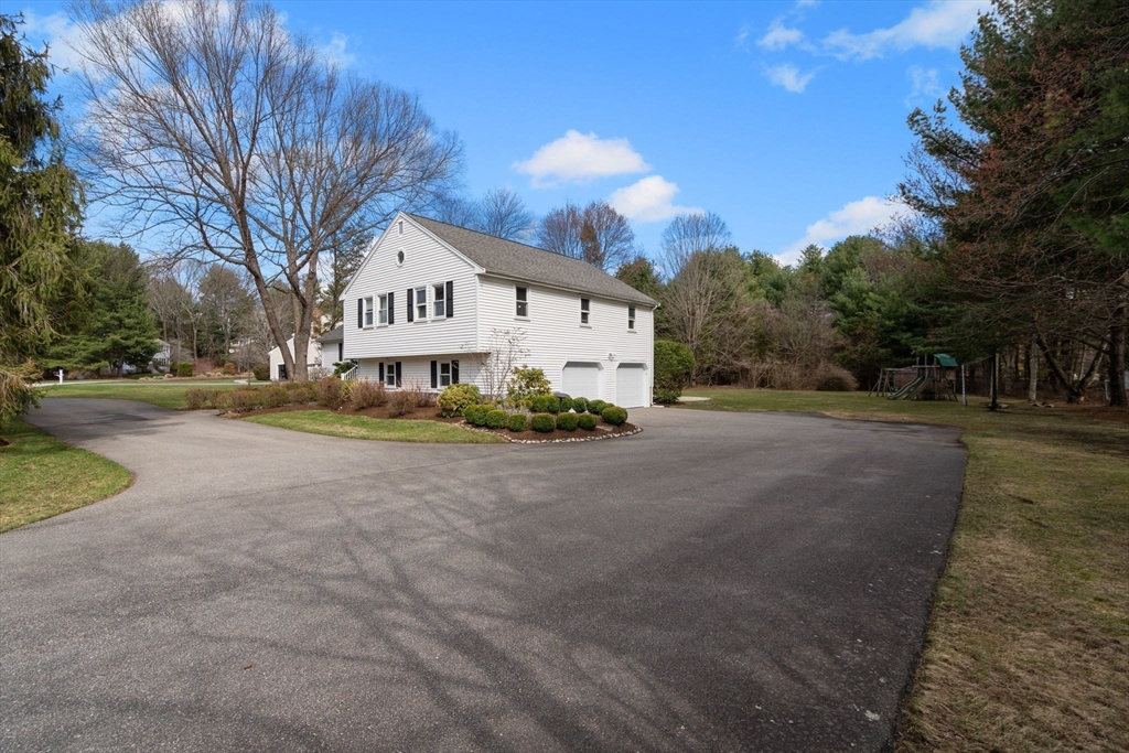 16 Blacksmith Drive Medfield, MA 02052 - Photo 33 of 40 a view of large house with a street