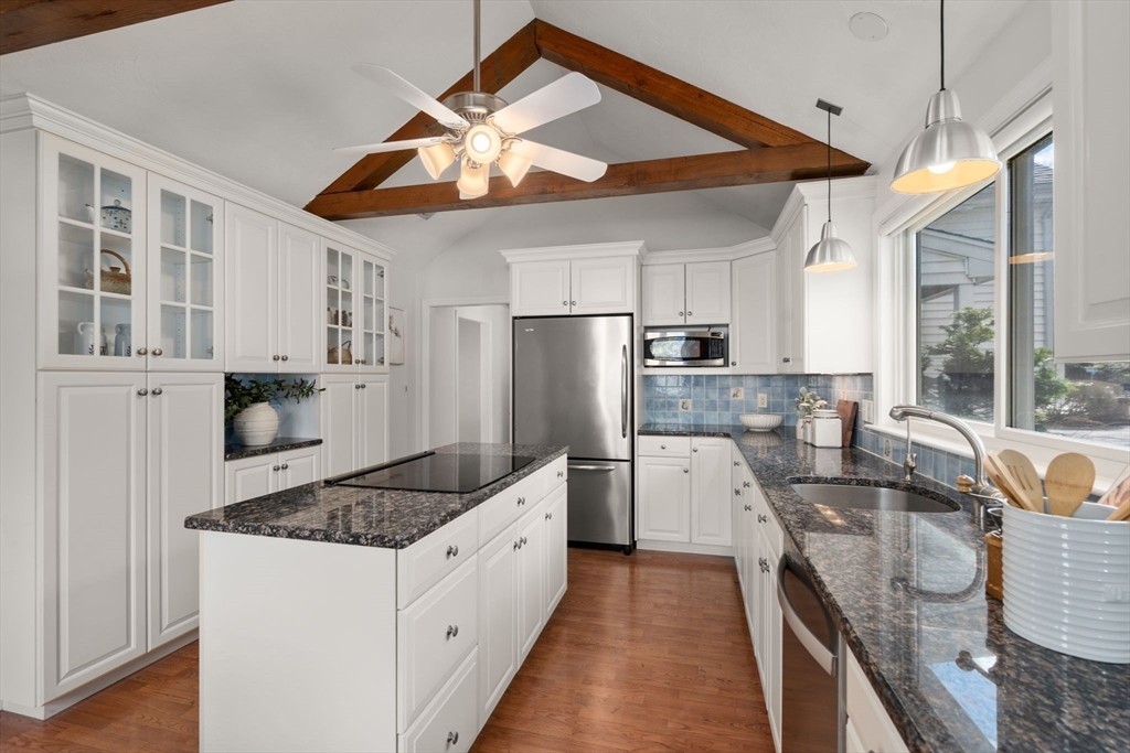 16 Blacksmith Drive Medfield, MA 02052 - Photo 8 of 40 a kitchen with stainless steel appliances granite countertop a sink stove and refrigerator