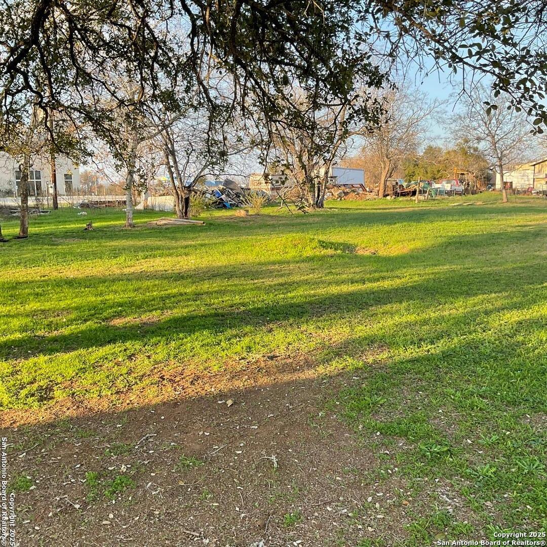 108 4th Street Sutherland Springs, TX 78161 - Photo 2 of 9 a view of a building with trees in the background