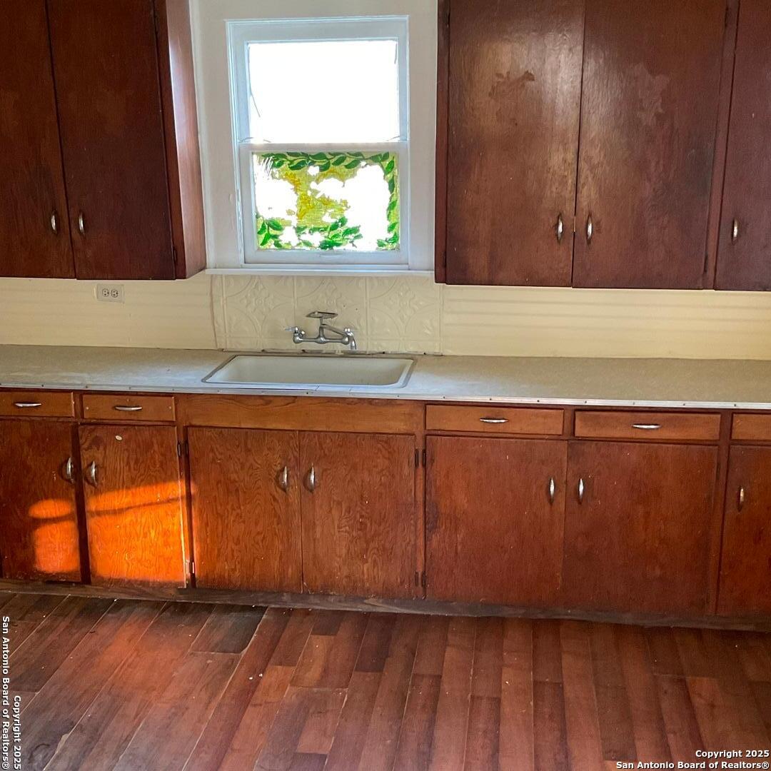 108 4th Street Sutherland Springs, TX 78161 - Photo 5 of 9 a view of front door with wooden floor