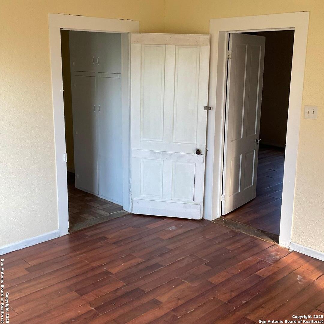 108 4th Street Sutherland Springs, TX 78161 - Photo 6 of 9 a view of a hallway with wooden floor