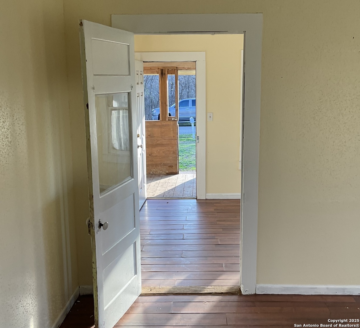 108 4th Street Sutherland Springs, TX 78161 - Photo 8 of 9 a view of a hallway with wooden floor