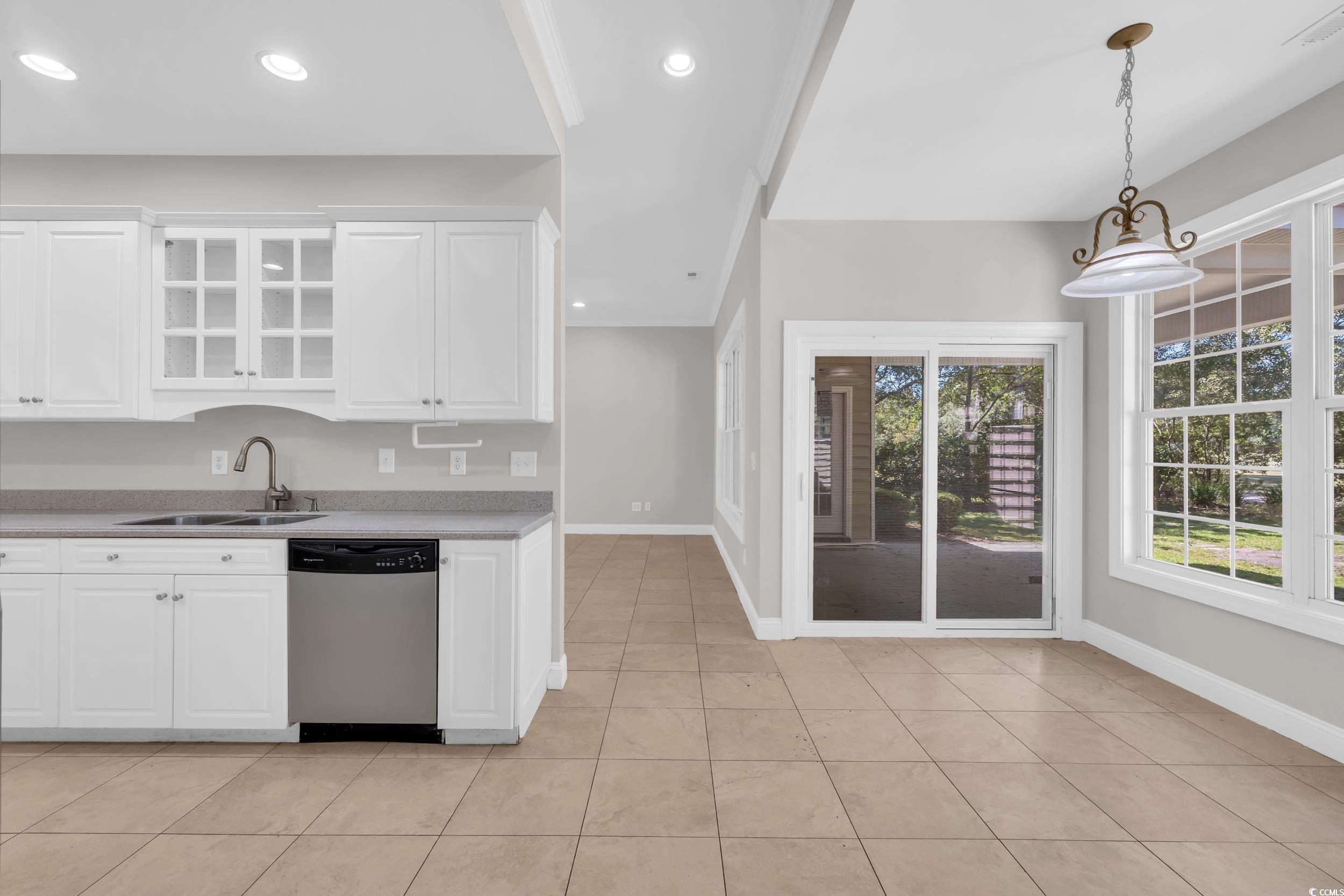208 Lander Drive Conway, SC 29526 - Photo 18 of 40 Kitchen featuring white cabinetry, dishwasher, glass insert cabinets, pendant lighting, and recessed lighting