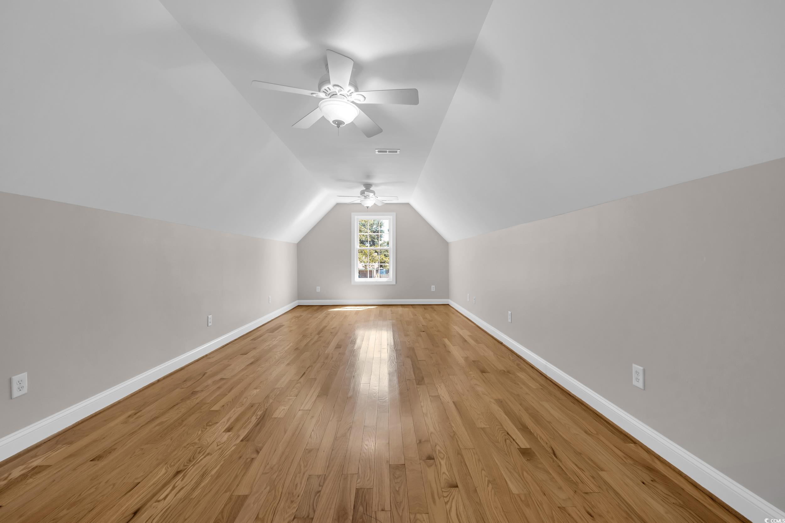 208 Lander Drive Conway, SC 29526 - Photo 25 of 40 Additional living space with vaulted ceiling, light wood finished floors, and ceiling fan