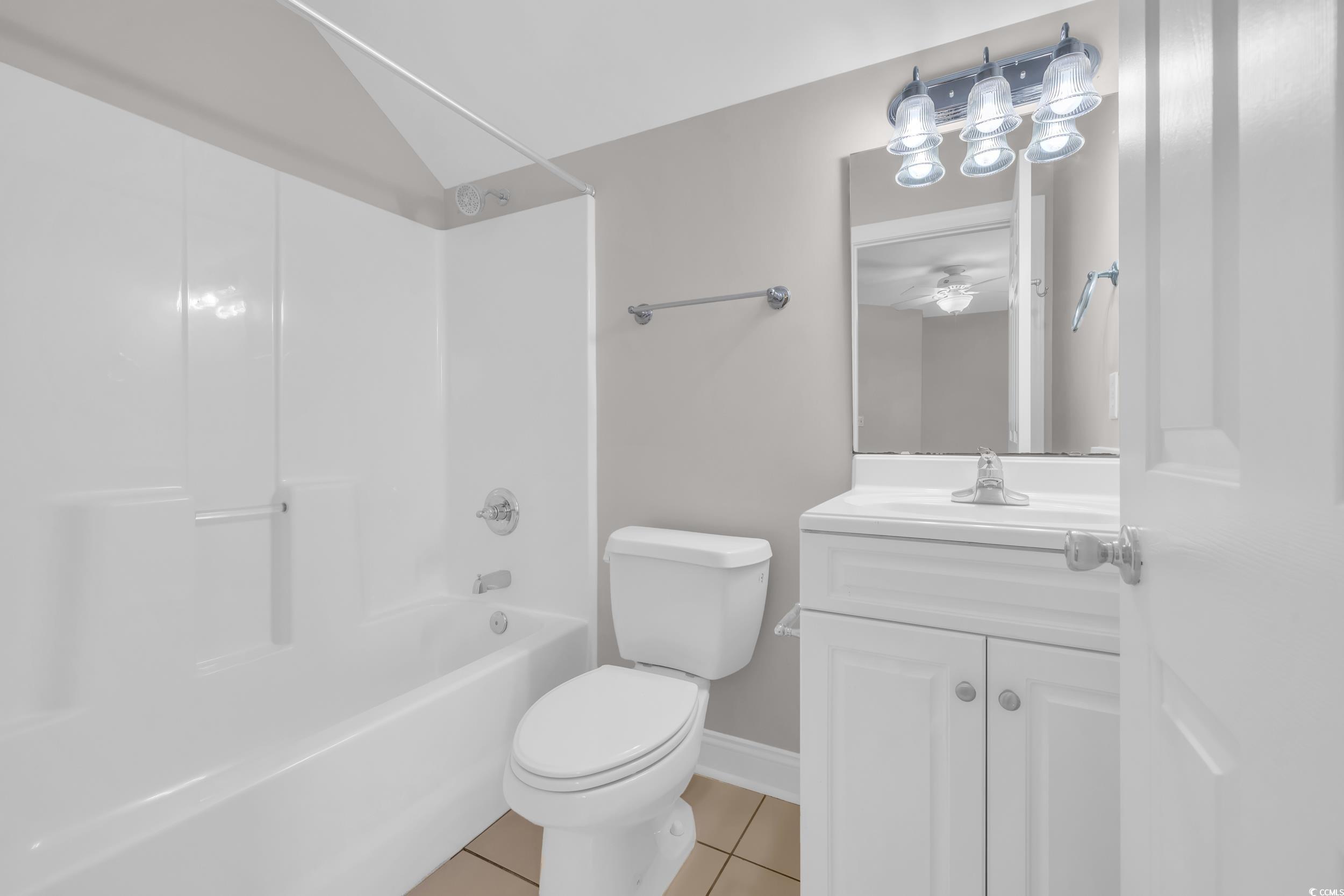 208 Lander Drive Conway, SC 29526 - Photo 28 of 40 Bathroom with light tile patterned floors, shower combination, and vanity
