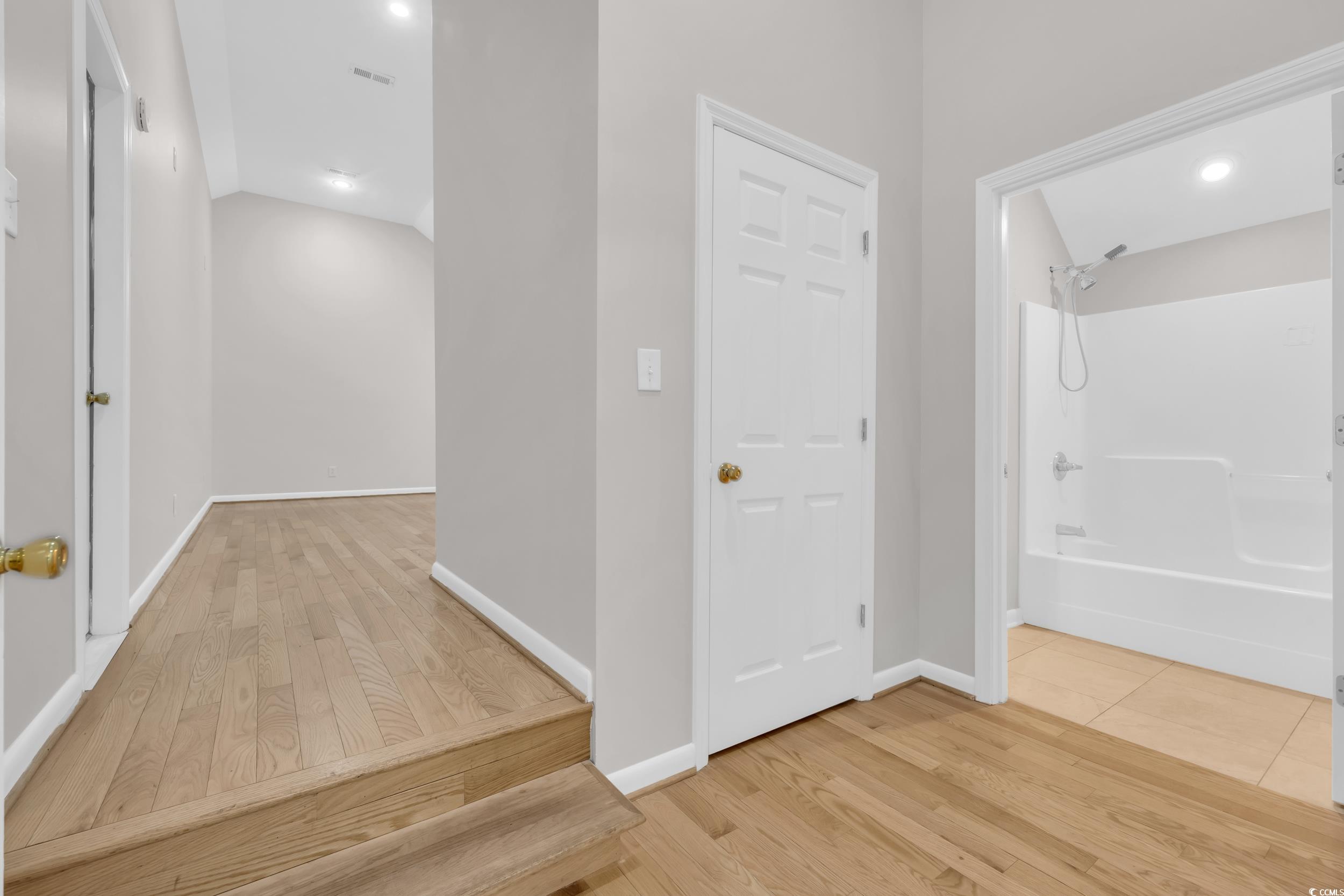208 Lander Drive Conway, SC 29526 - Photo 29 of 40 Corridor featuring light wood-style flooring, recessed lighting, and vaulted ceiling