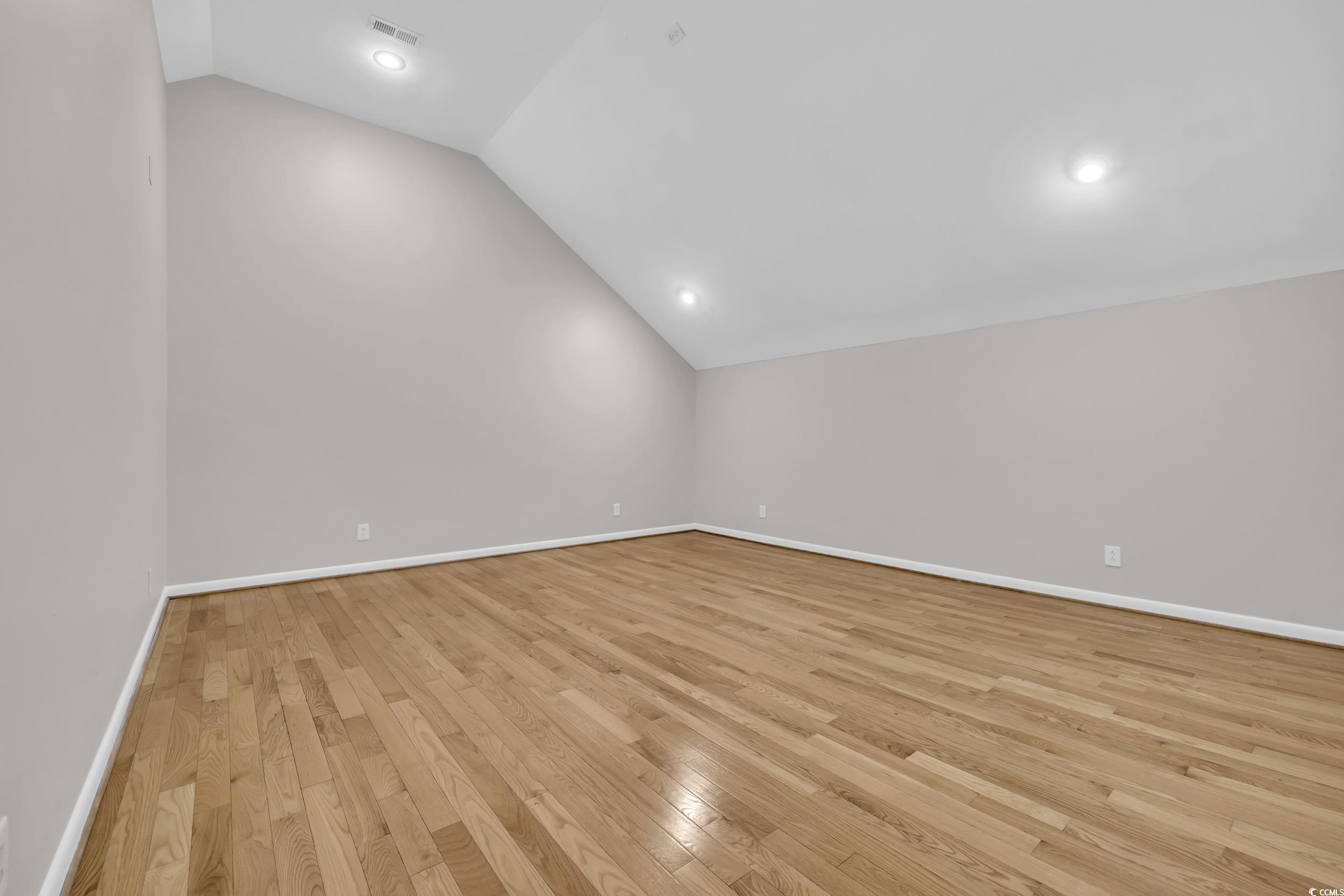 208 Lander Drive Conway, SC 29526 - Photo 31 of 40 Unfurnished room with light wood-type flooring, vaulted ceiling, and recessed lighting
