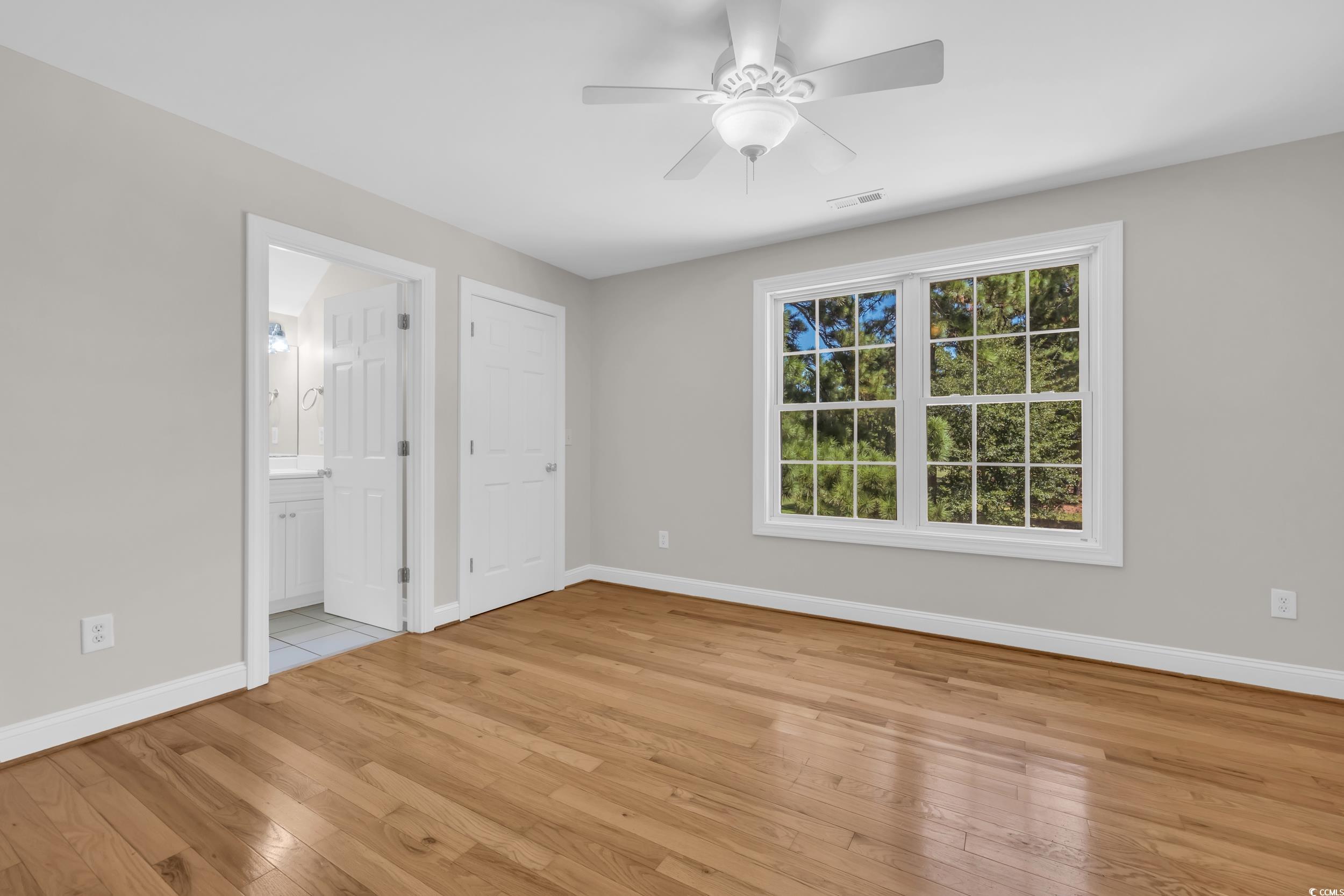 208 Lander Drive Conway, SC 29526 - Photo 5 of 40 Unfurnished bedroom with light wood-style flooring and a ceiling fan