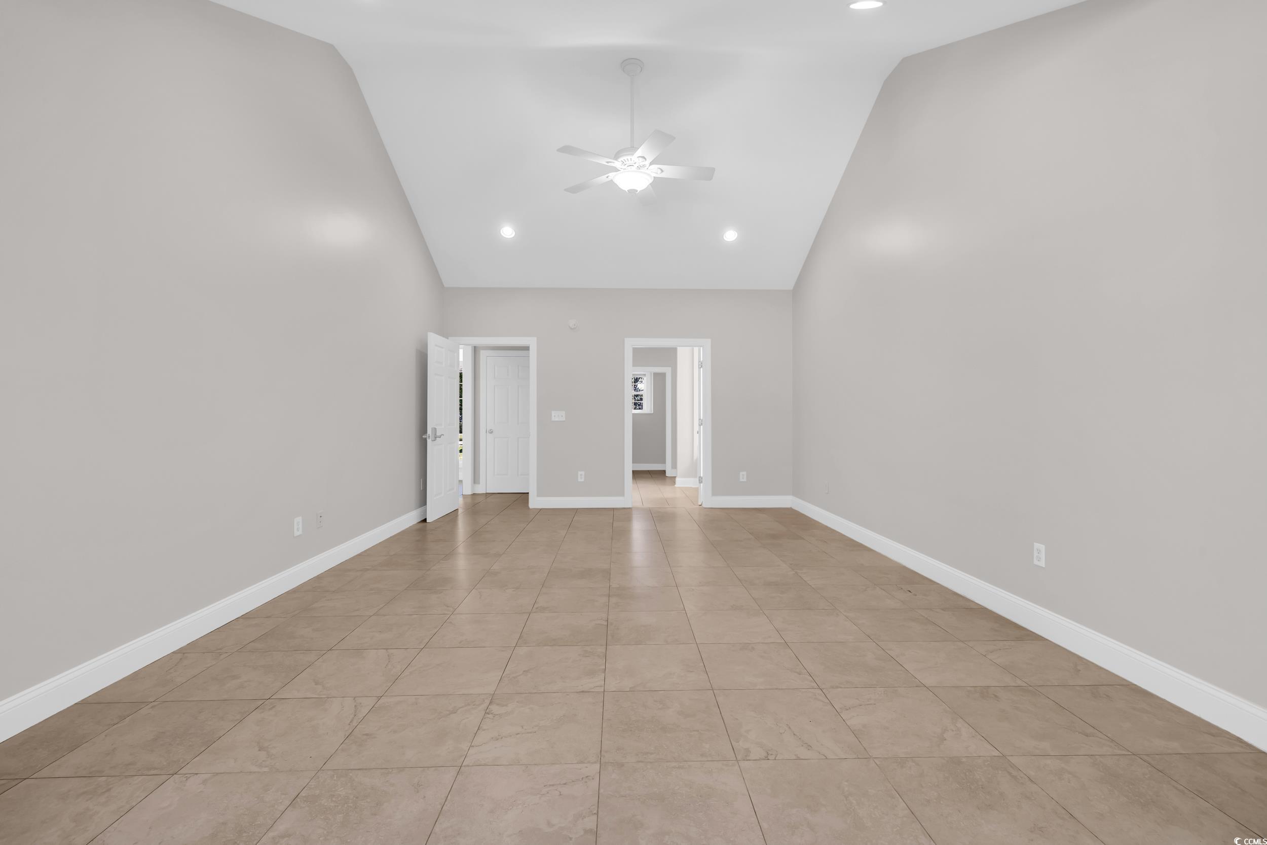 208 Lander Drive Conway, SC 29526 - Photo 10 of 40 Unfurnished room with recessed lighting, high vaulted ceiling, light tile patterned flooring, and ceiling fan