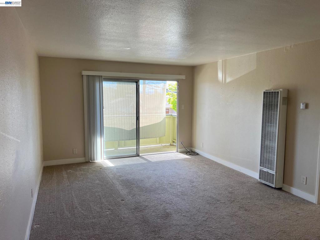 36976 Mulberry Street Newark, CA 94560 - Photo 17 of 34 an empty room with large windows