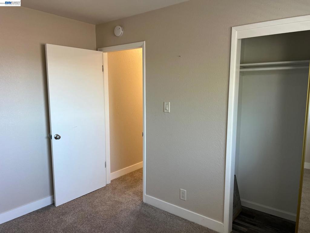 36976 Mulberry Street Newark, CA 94560 - Photo 29 of 34 a view of walk in closet with empty racks