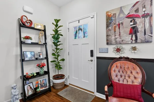 a room with furniture and wooden floor