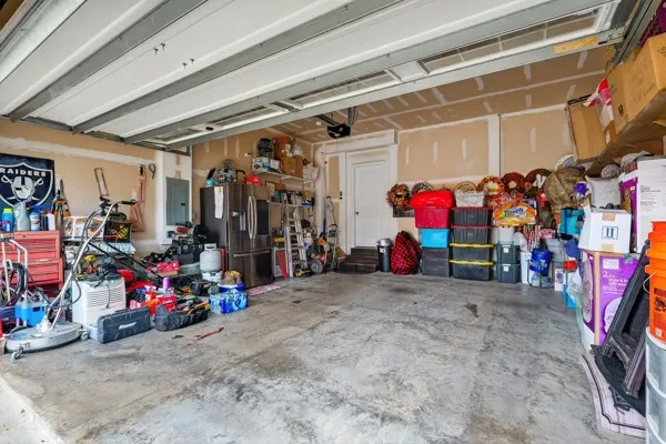 a view of a garage with rack and bicycle