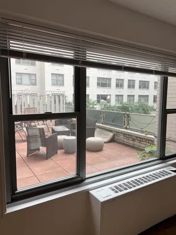 a view of a living room and a window