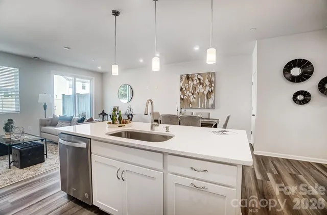 a view of a center island and living room