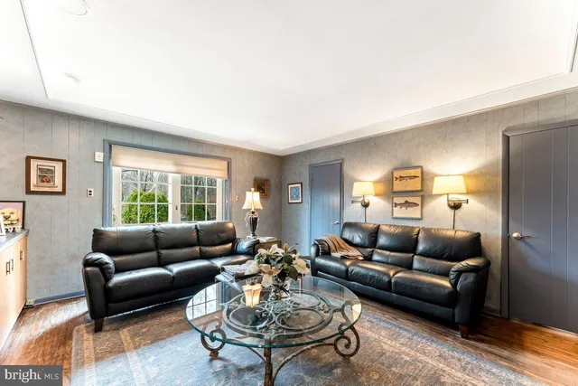 a bathroom with a sink vanity and mirror