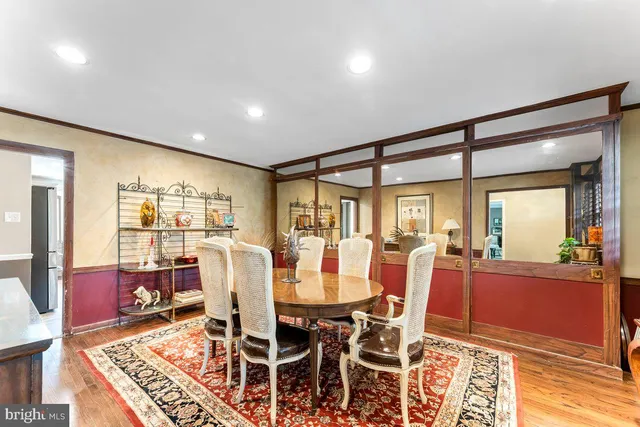 a bedroom with a bed and ceiling fan