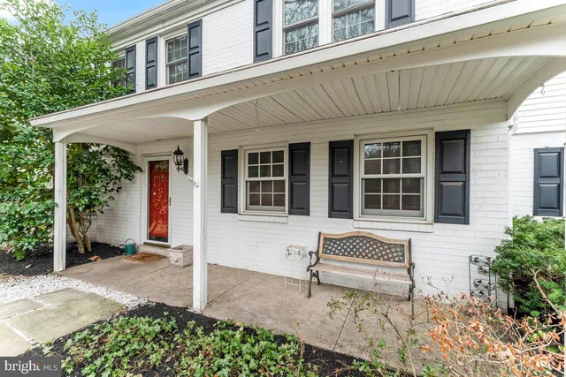 a front view of a house with a porch