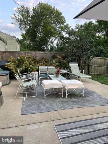 a view of small yard with furniture