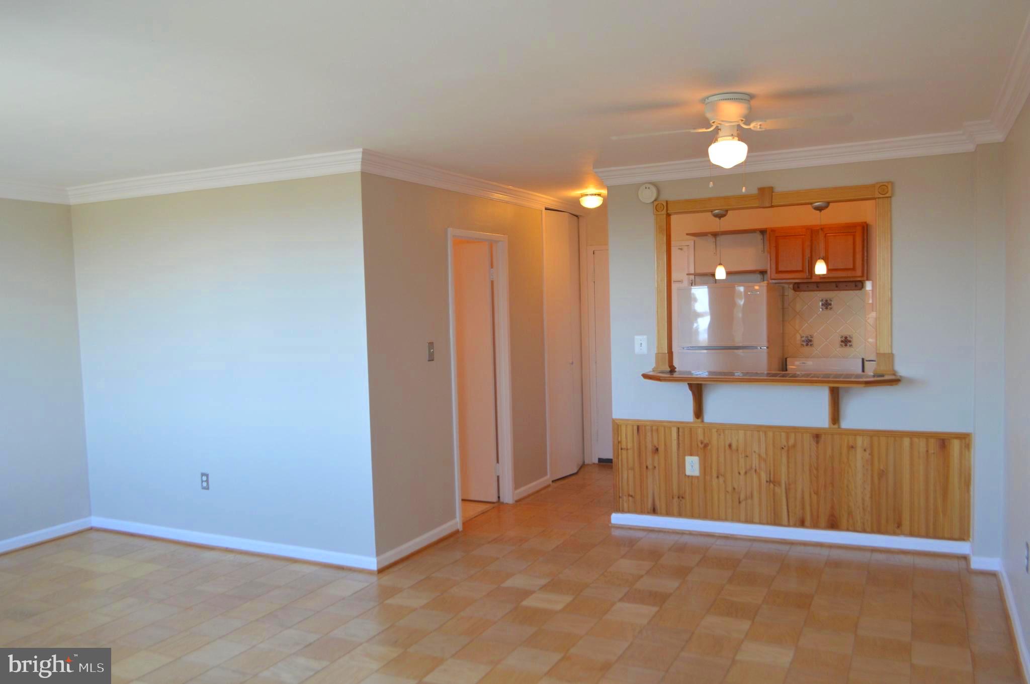 2800 Wisconsin Avenue Northwest, Unit 601 Washington, DC 20007 - Photo 12 of 23 an empty room with a ceiling fan and bathroom space