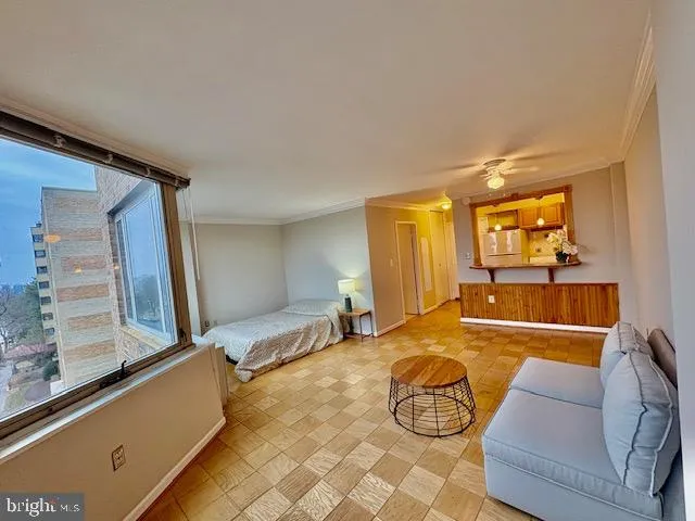 a view of an empty room with a window