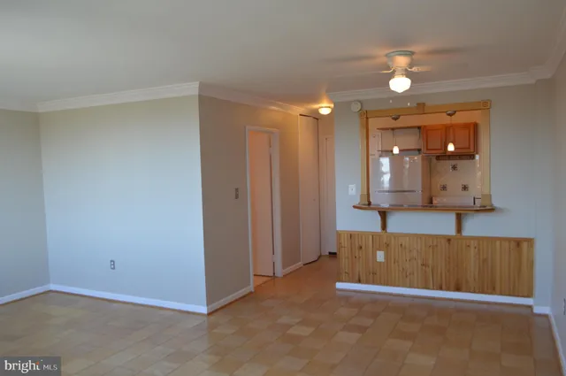 a kitchen with a sink a stove and refrigerator