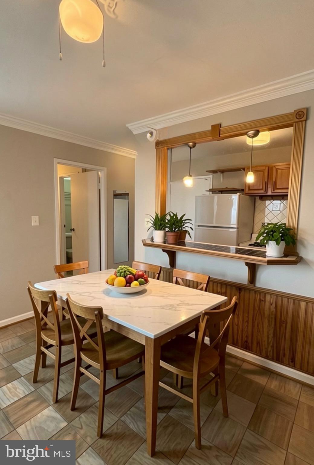 2800 Wisconsin Avenue Northwest, Unit 601 Washington, DC 20007 - Photo 10 of 23 Bright and inviting dining space awaits gathering.
