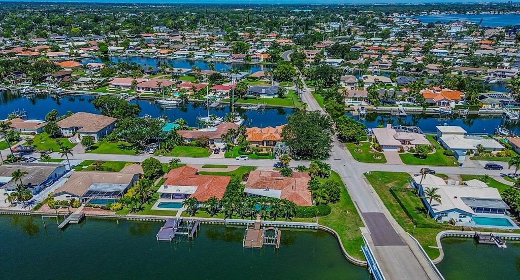 1998 Kansas Avenue Northeast St. Petersburg, FL 33703 - Photo 4 of 14 an aerial view of residential houses with outdoor space and street view