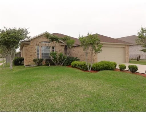 a view of a back yard of the house
