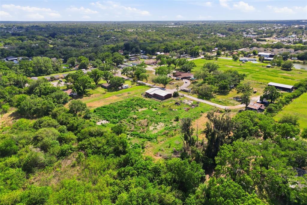 Shell Point Road Ruskin, FL 33570 - Photo 4 of 13 an aerial view of residential houses with outdoor space and trees