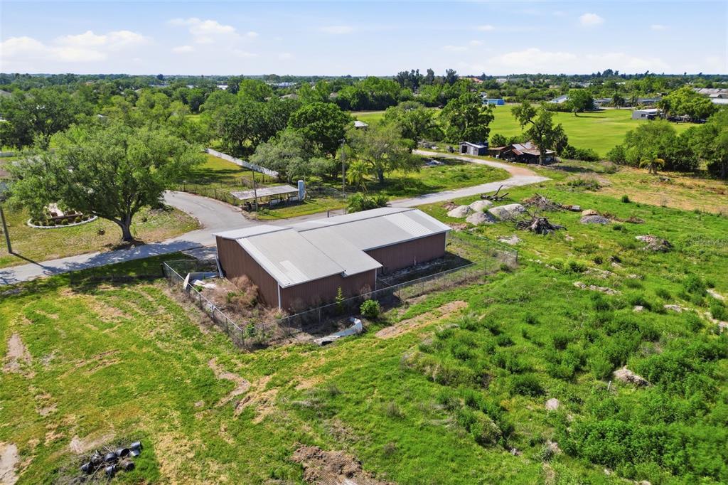 Shell Point Road Ruskin, FL 33570 - Photo 6 of 13 an aerial view of a house with yard swimming pool and outdoor seating