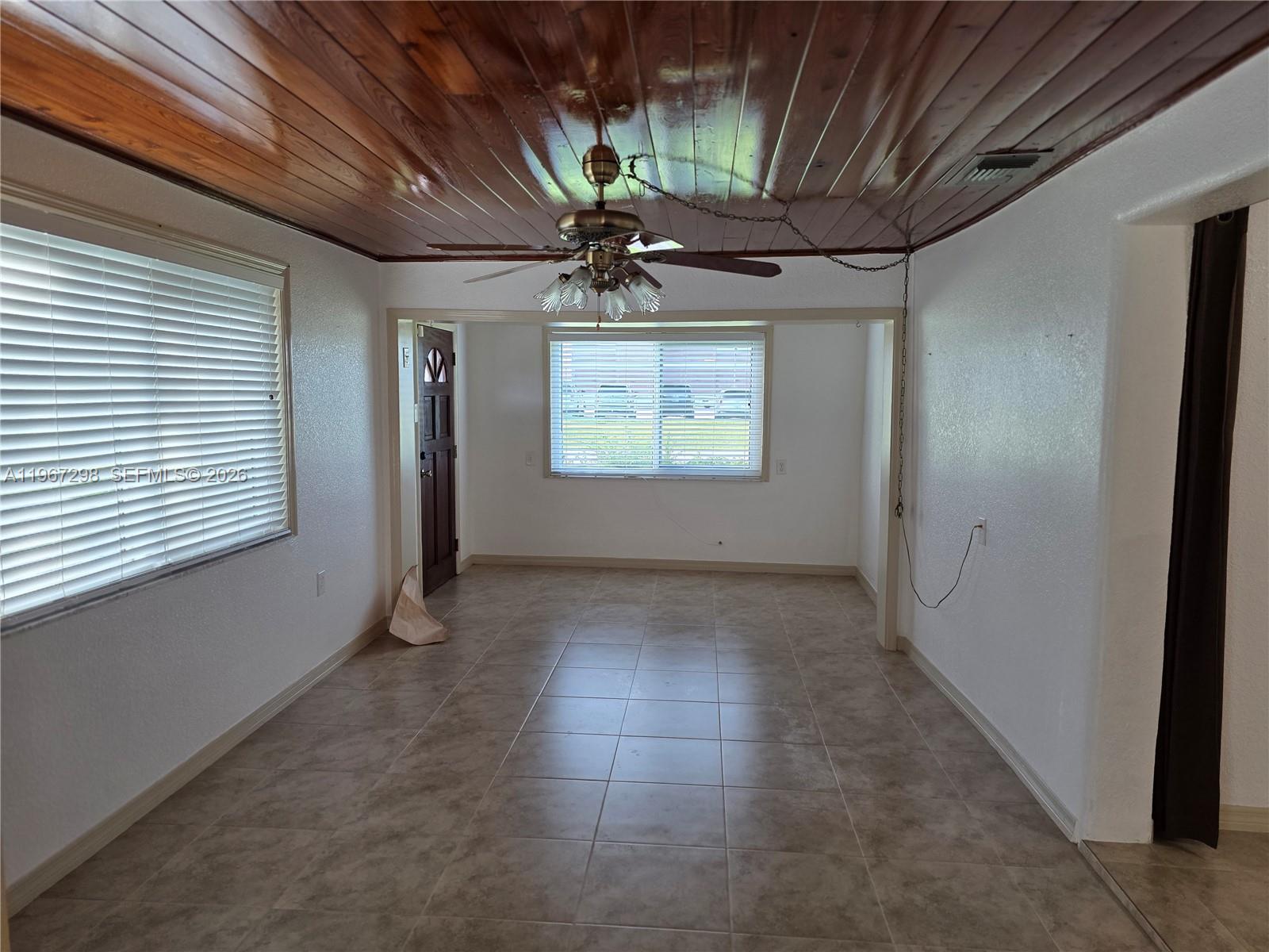 4321 Kirby Loop Road, Unit 1 Fort Pierce, FL 34981 - Photo 11 of 21 a view of an empty room with a window