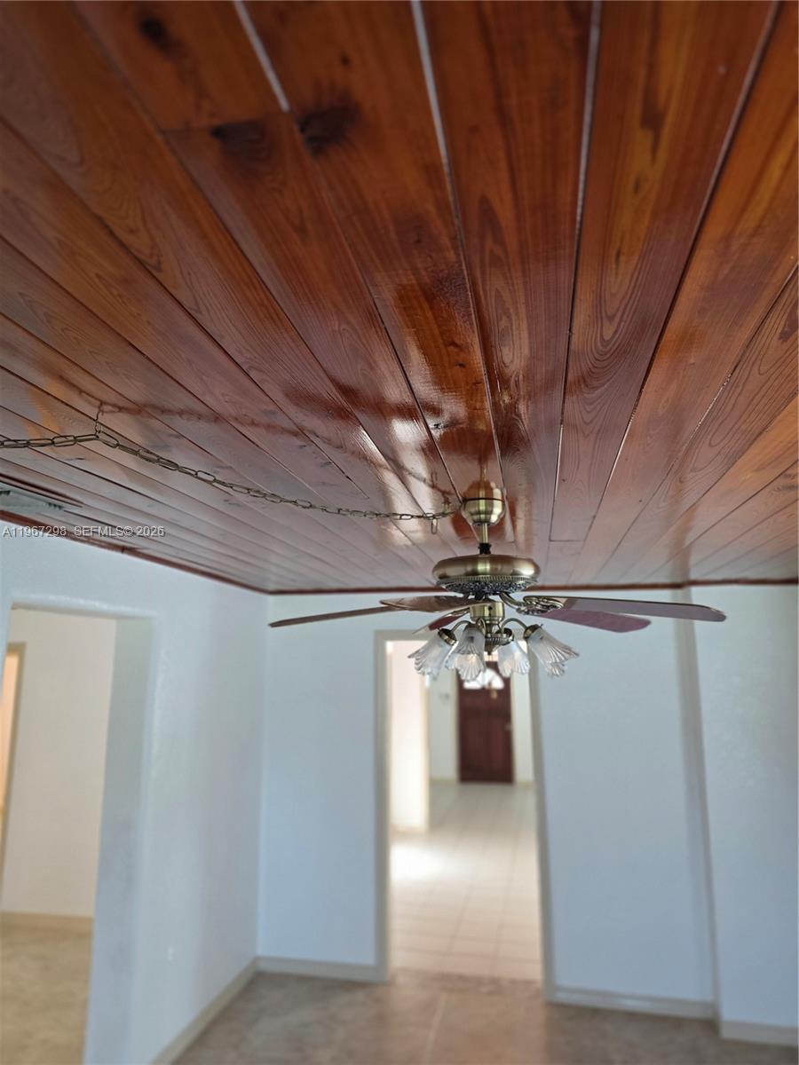 4321 Kirby Loop Road, Unit 1 Fort Pierce, FL 34981 - Photo 14 of 21 a view of a livingroom with a chandelier