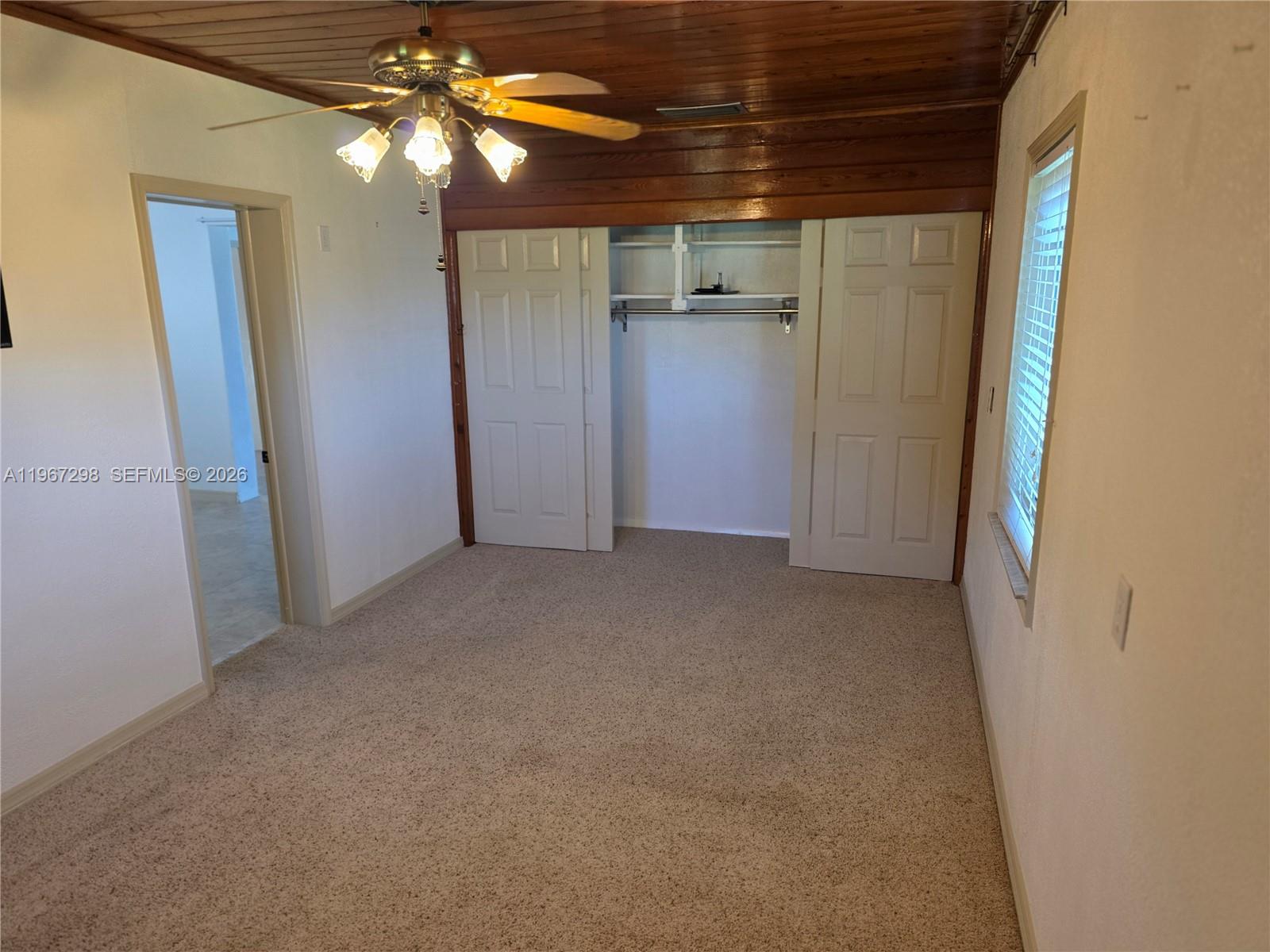 4321 Kirby Loop Road, Unit 1 Fort Pierce, FL 34981 - Photo 15 of 21 a view of empty room with window