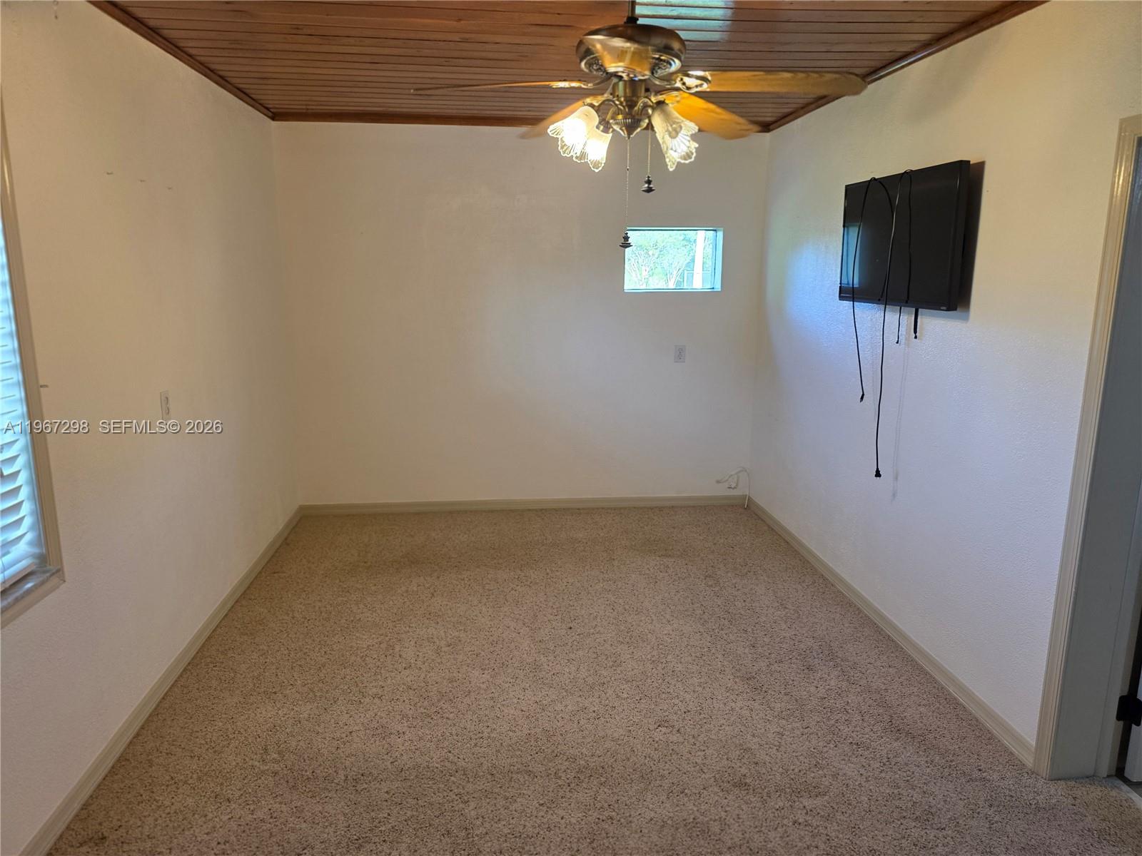 4321 Kirby Loop Road, Unit 1 Fort Pierce, FL 34981 - Photo 16 of 21 a view of a livingroom with a flat screen tv