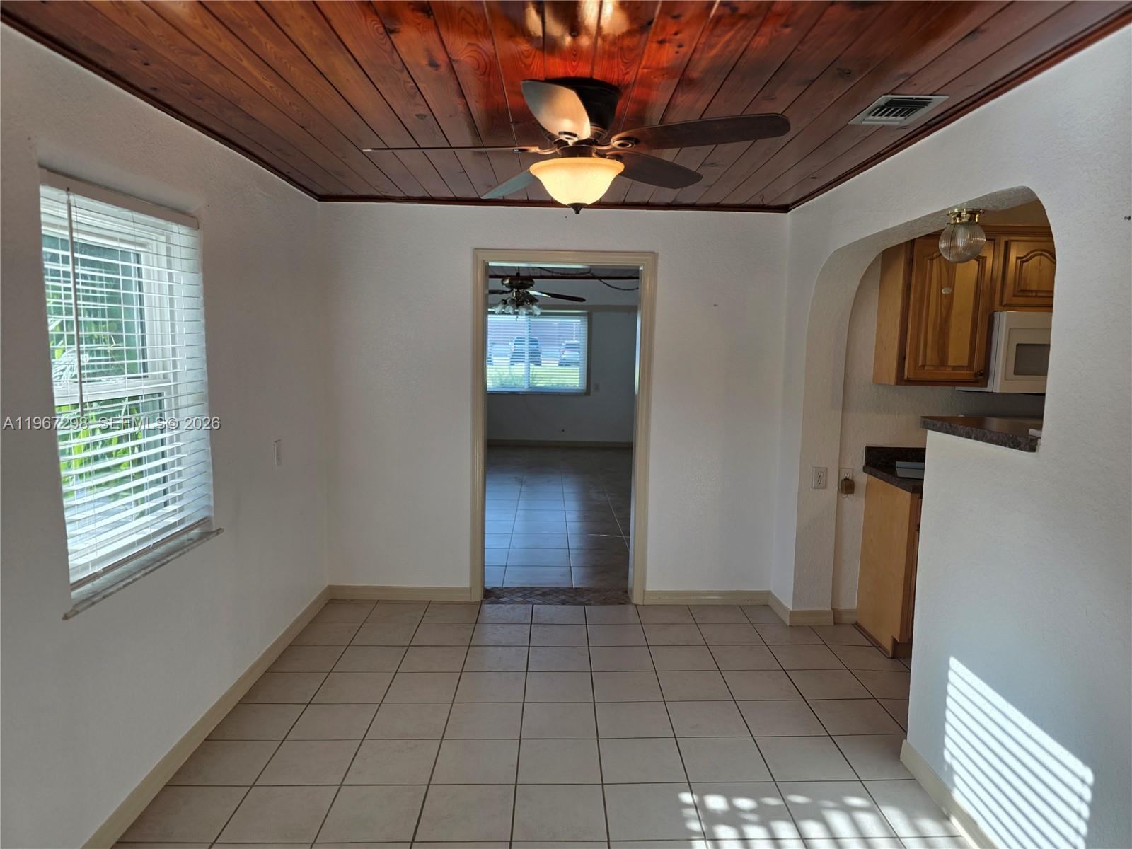 4321 Kirby Loop Road, Unit 1 Fort Pierce, FL 34981 - Photo 8 of 21 a view of an empty room and window