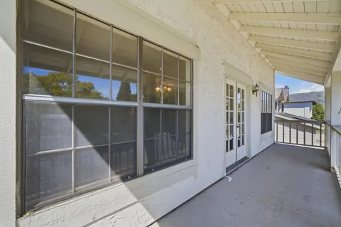 an empty room with sliding door