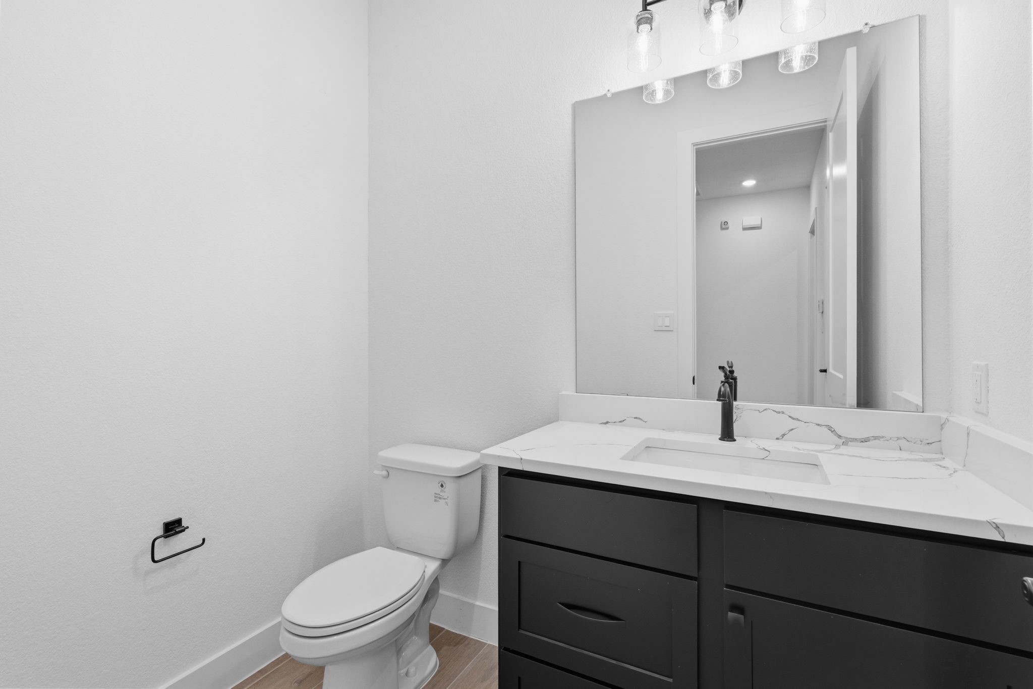 633 Cross Timbers Trace Waller, TX 77484 - Photo 28 of 42 a bathroom with a sink and a toilet