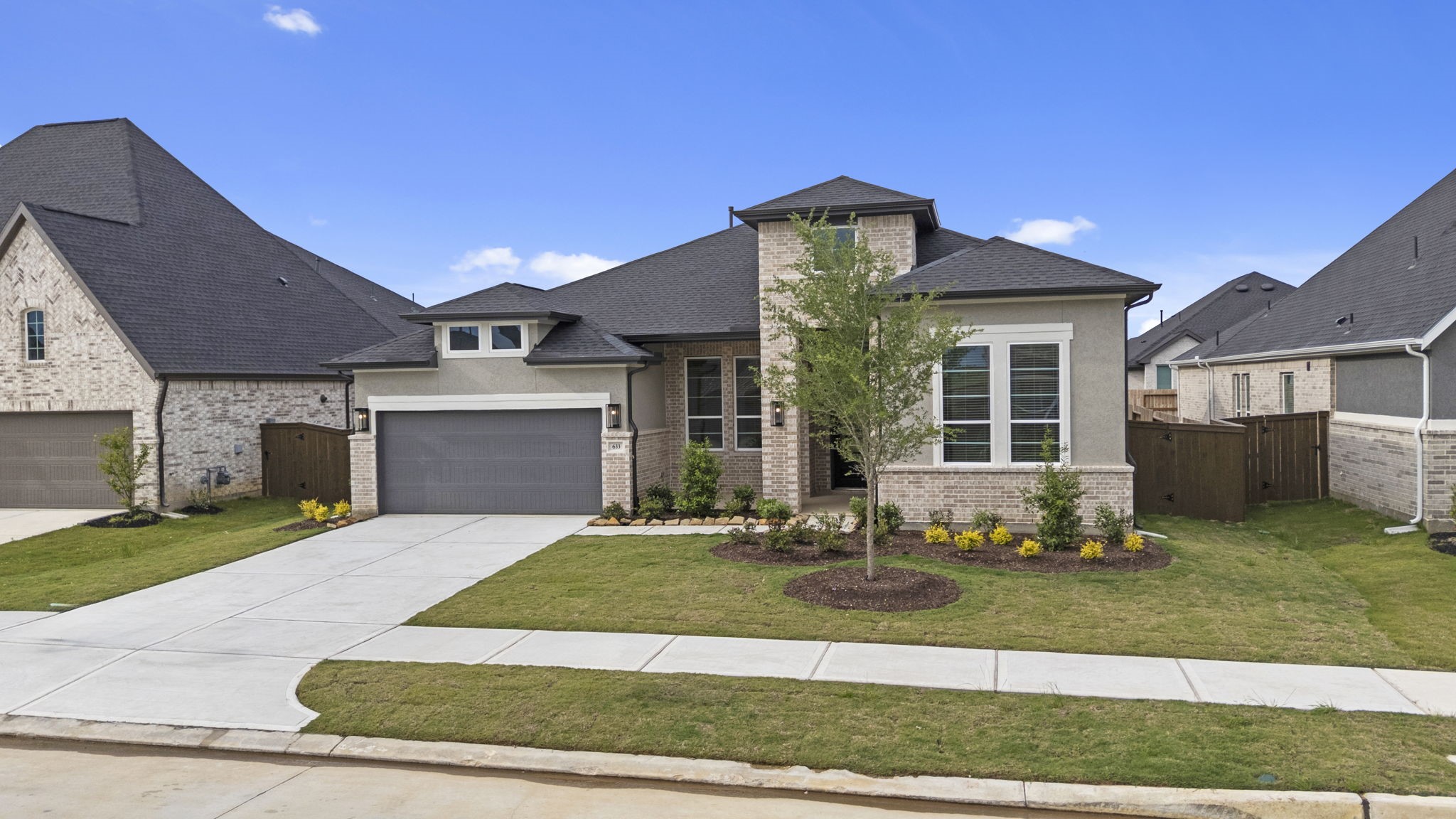 633 Cross Timbers Trace Waller, TX 77484 - Photo 33 of 42 a front view of a house with a yard