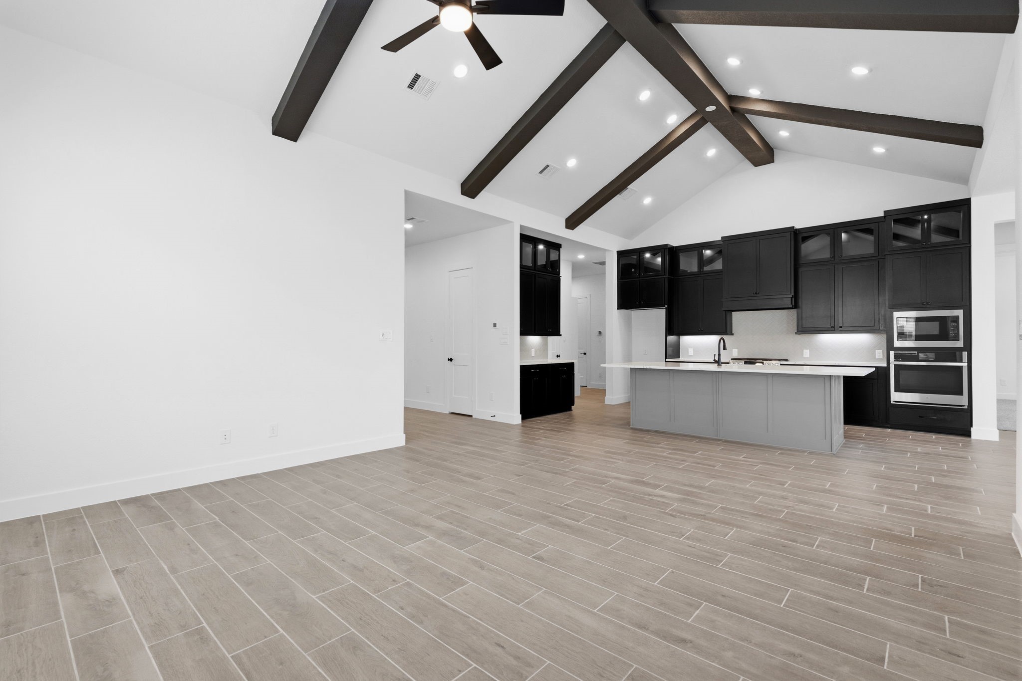 633 Cross Timbers Trace Waller, TX 77484 - Photo 9 of 42 a view of a kitchen with a sink and dishwasher