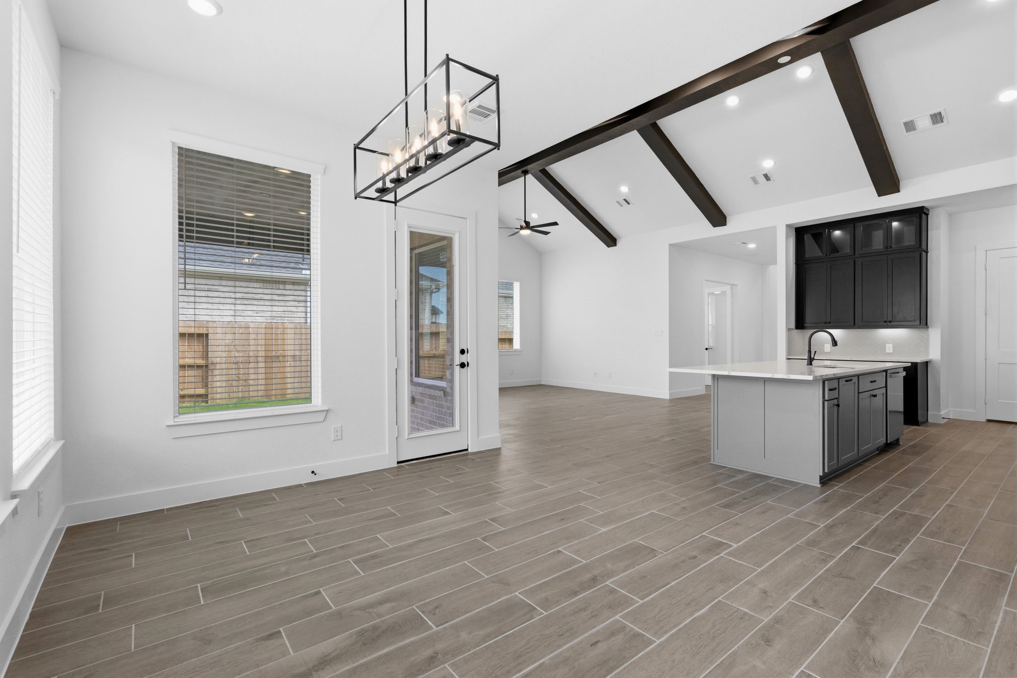 633 Cross Timbers Trace Waller, TX 77484 - Photo 10 of 42 a view of entryway and kitchen