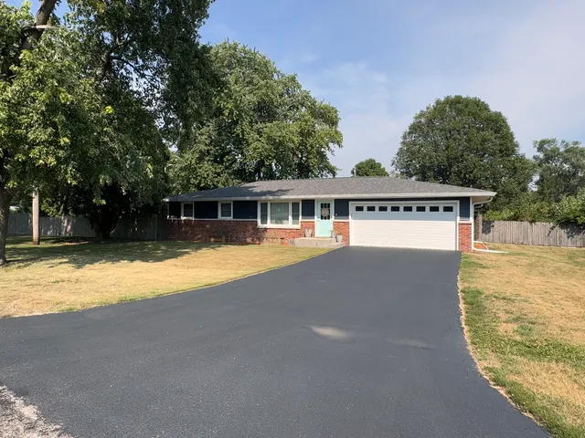 front view of house with a yard
