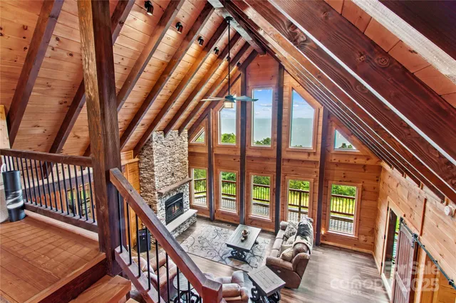 a view of living room floor with furniture and a window
