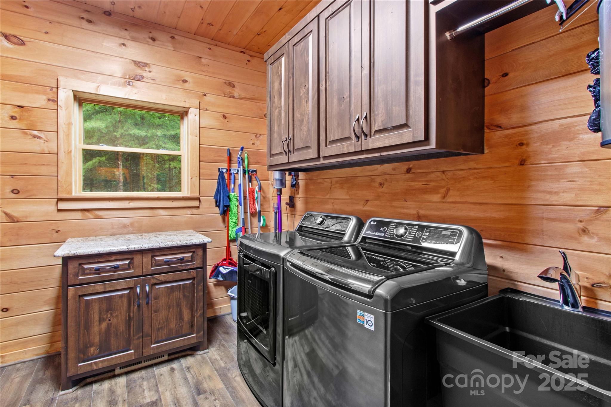 1220 Sierra Trace Road Denton, NC 27239 - Photo 39 of 48 a kitchen with stainless steel appliances granite countertop a stove and a sink