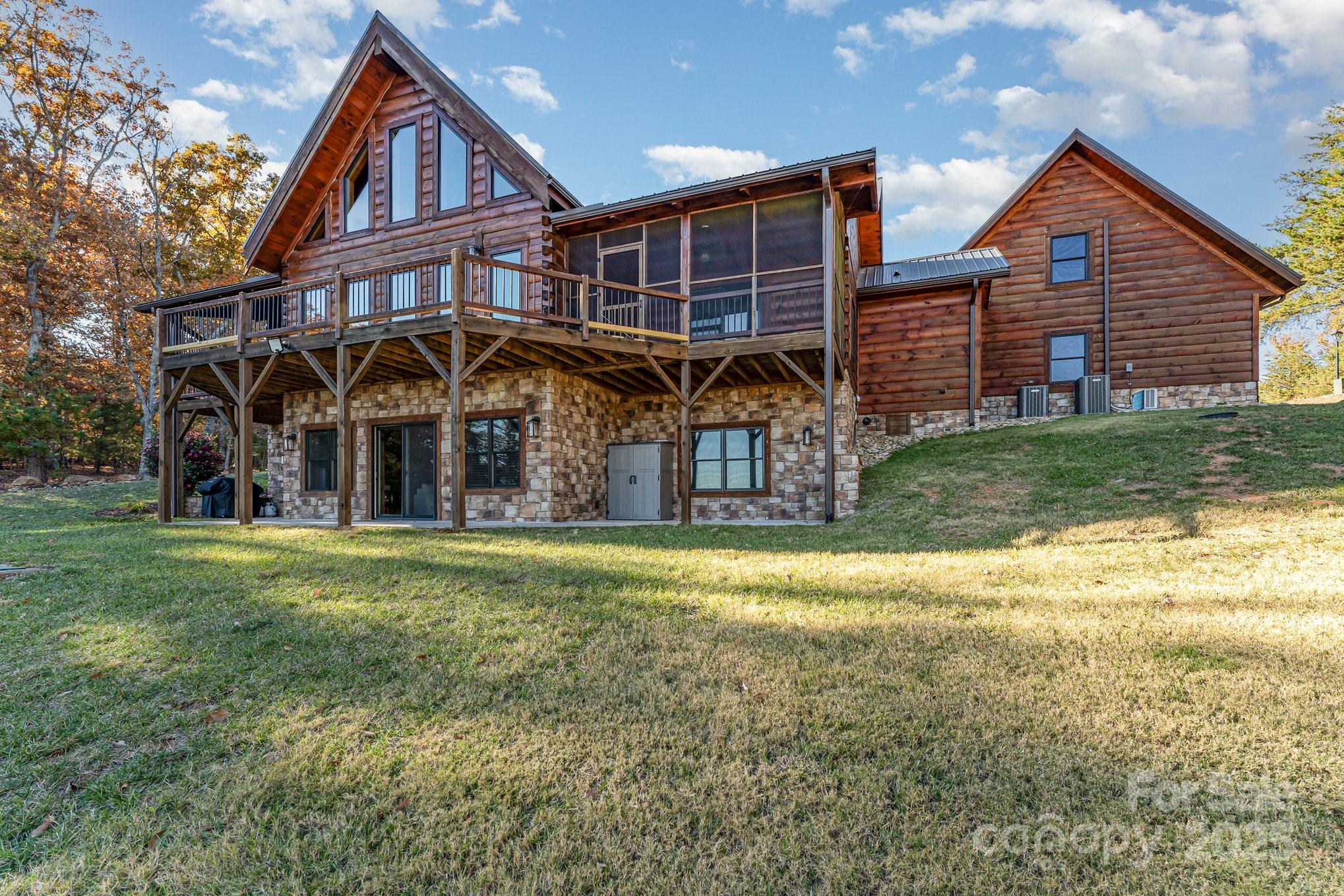 1220 Sierra Trace Road Denton, NC 27239 - Photo 42 of 48 a front view of a house with a yard