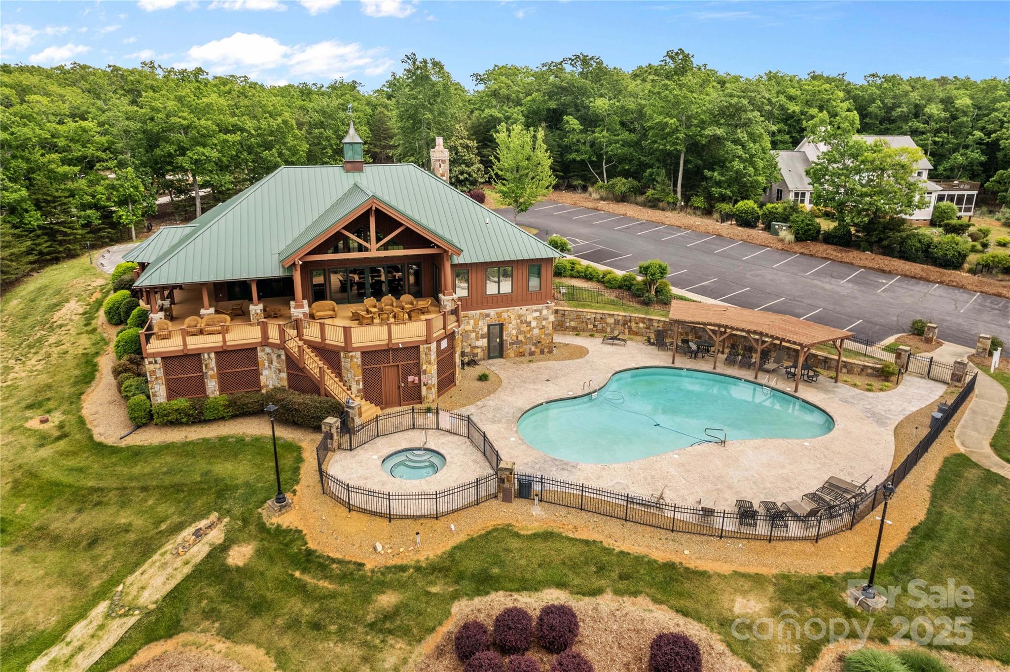 1220 Sierra Trace Road Denton, NC 27239 - Photo 48 of 48 an aerial view of a house with swimming pool garden and mountain view