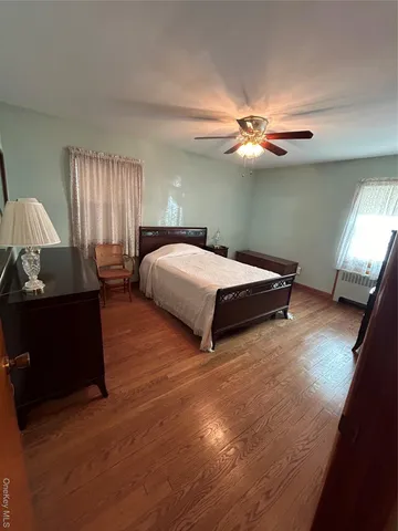 a view of room with furniture and window