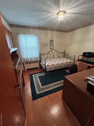 a room with furniture and a window