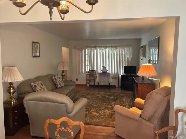 view of hallway with wooden floor