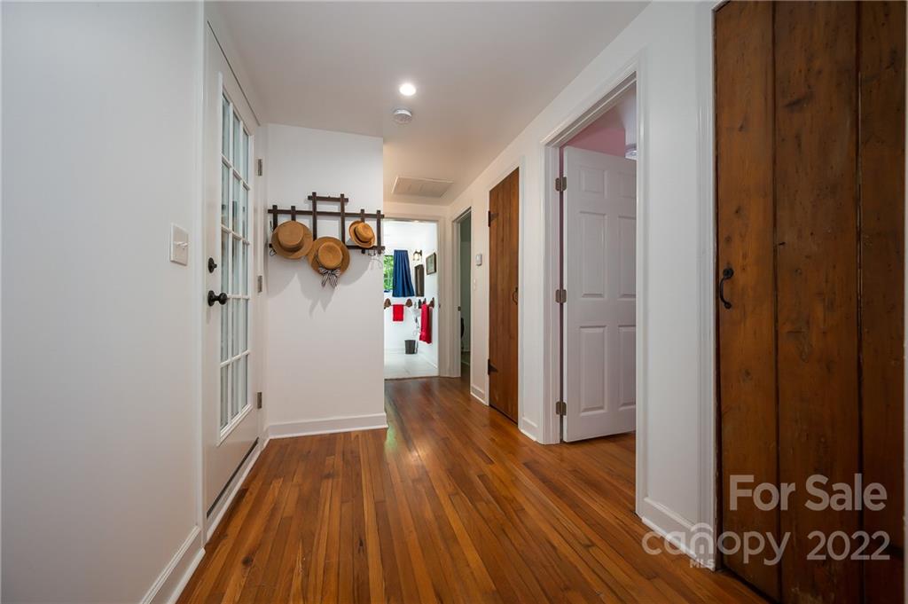 146 Hidden Hill Road Tryon, NC 28782 - Photo 17 of 43 a view of hallway with wooden floor
